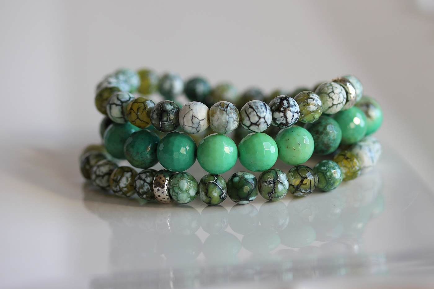 Stunning stack of vibrant green Agate Stretch Bracelets.