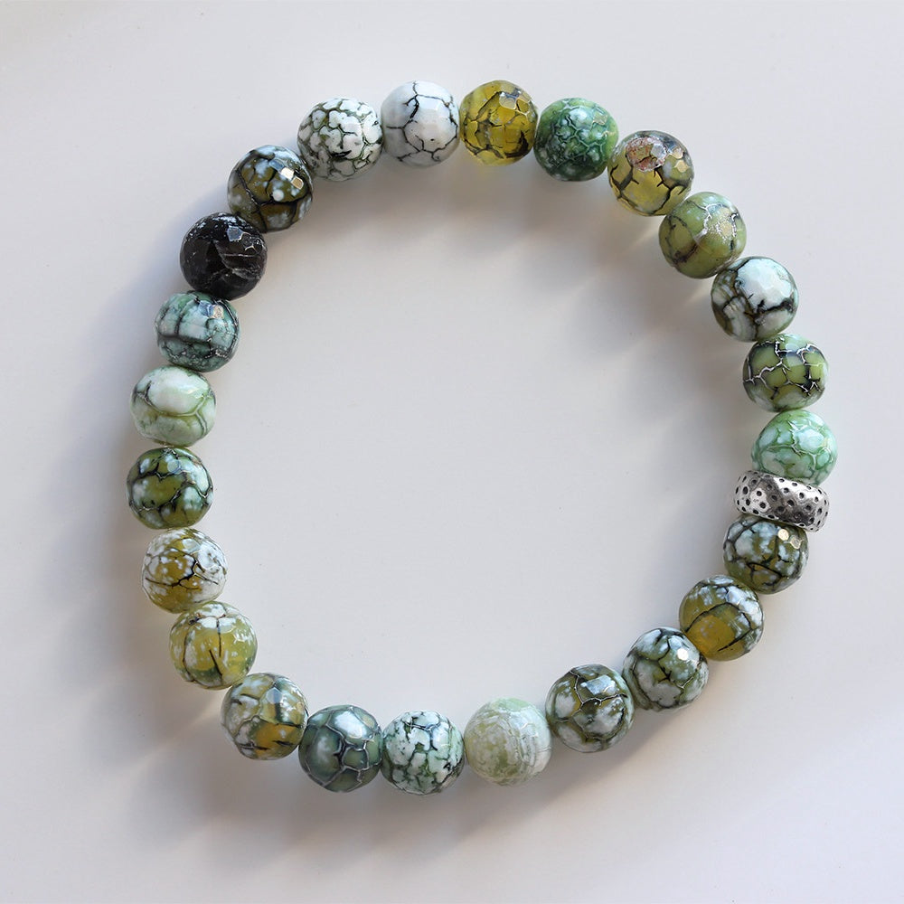 6mm Dragon Vein Agate Stretch Bracelet casting shadows in the sunlight. 