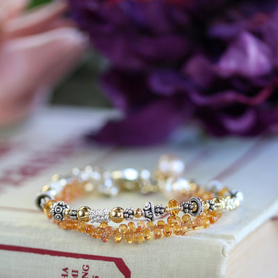 Elisa Ilana Citrine birthstone bracelet with faceted golden citrine beads, sterling silver and 14k gold accent details, handcrafted November jewelry designed to add warm yellow gemstone sparkle.