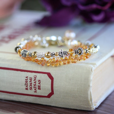 Elisa Ilana Citrine birthstone bracelet with faceted golden citrine beads, sterling silver and 14k gold accent details, handcrafted November jewelry designed to add warm yellow gemstone sparkle.