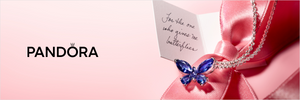 Pandora Timeless collection necklace featuring a sparkling blue butterfly pendant on a silver chain, styled with a pink ribbon and gift note reading “For the one who gives me butterflies.”