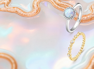 Elegant opal birthstone jewelry set against an iridescent background, featuring sterling silver halo stud earrings with shimmering opals, a silver opal halo ring accented with sparkling stones, and a gold beaded band adorned with opal and diamond details — perfect for celebrating October birthdays.