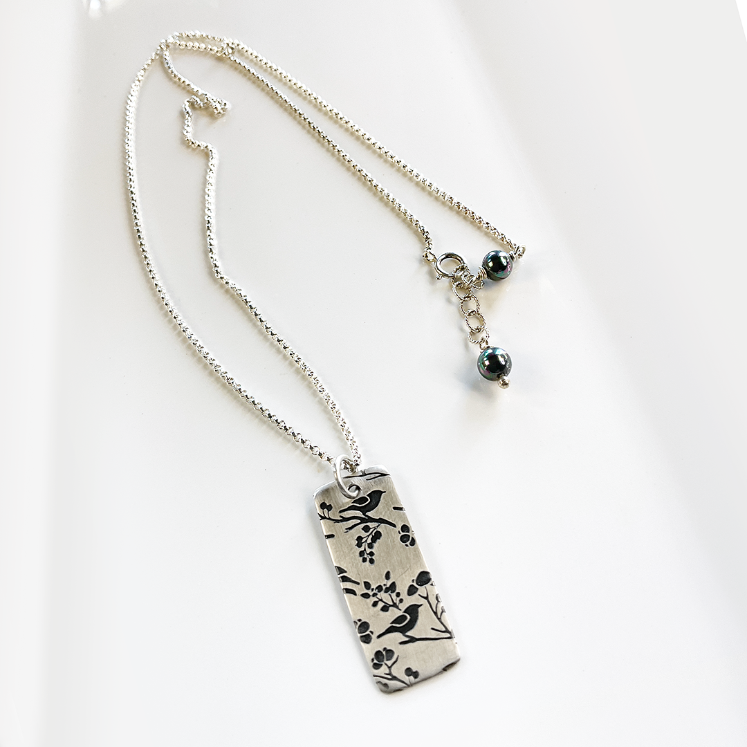 Songbird Pendant on SS Rolo Chain